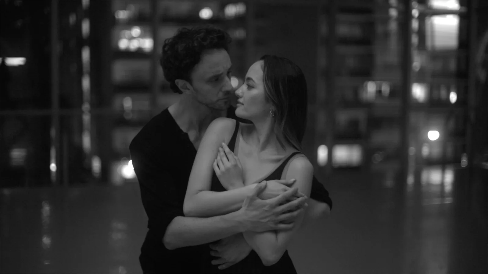 Film still: Kealan McLaughlin and his partner in an embrace