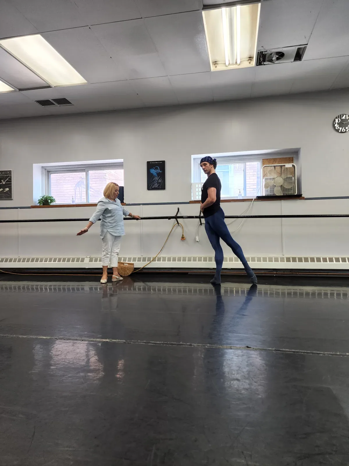 Kealan McLaughlin with his coach at the barre